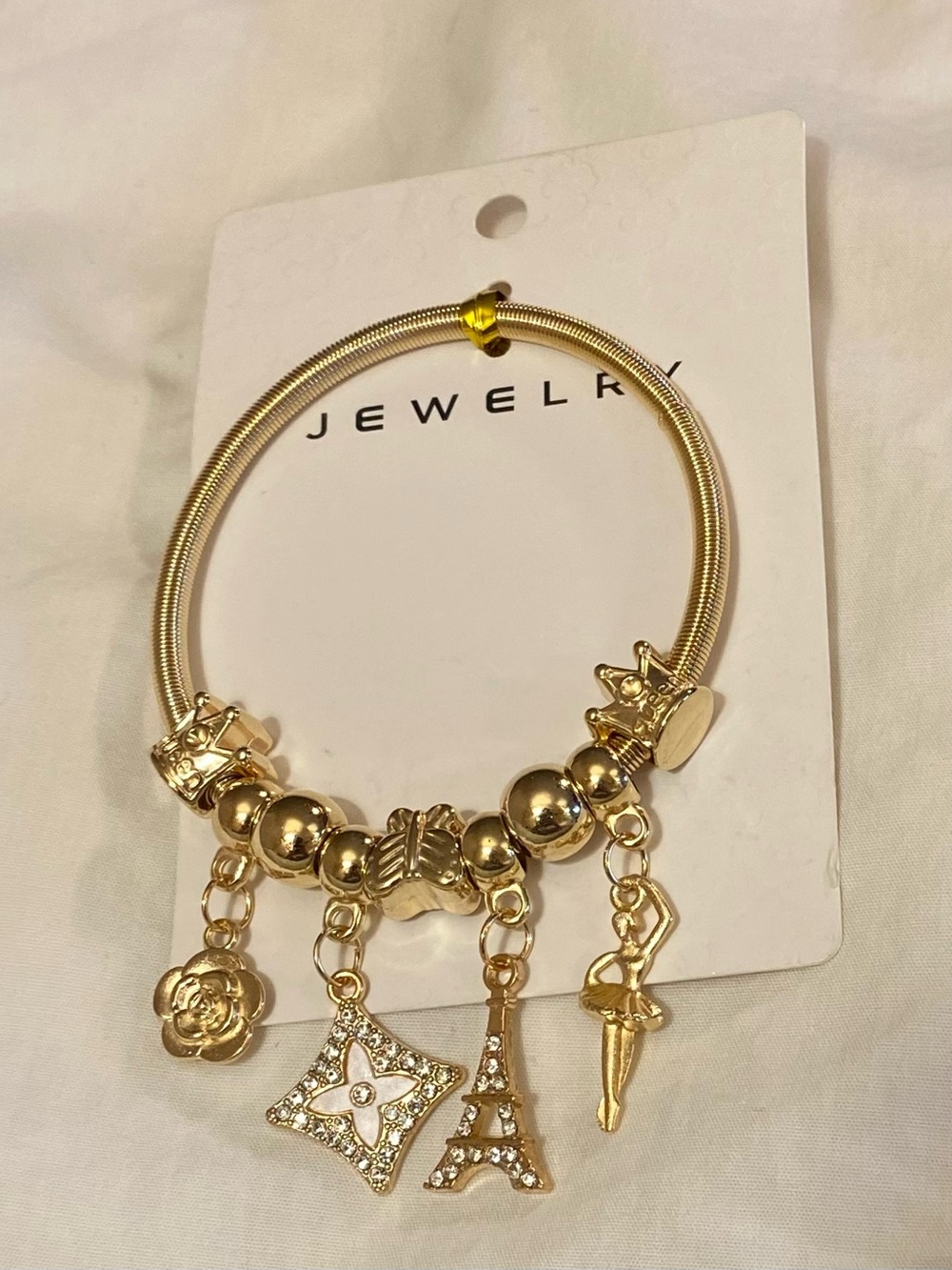 Gold Charm Bangle Bracelet with Eiffel Tower and Floral Charms
